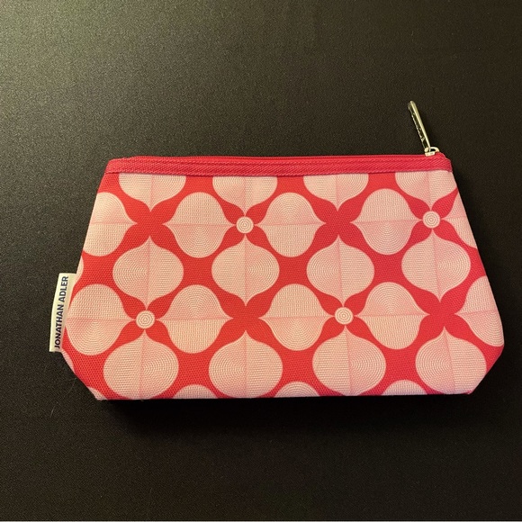 Clinique cosmetic case designed by Jonathan Adler in shades of pink. - Picture 1 of 3
